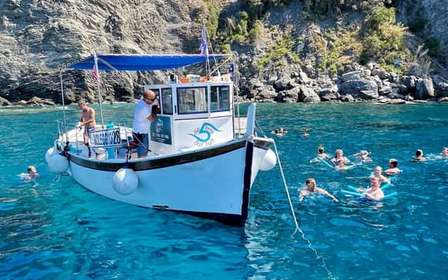 Cinque Terre boat tour with a traditional ligurian gozzo