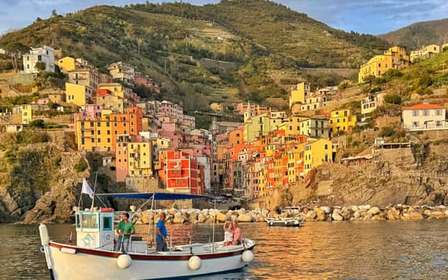 Cinque Terre Sunset Boat Tour on traditional ligurian gozzo
